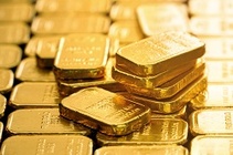 Gold down, dollar up as investors prepare for tapering