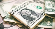 Dollar boost hits gold and silver as Fed hints at Feb rate rise