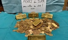 Gold bars and coins found stashed in old French house