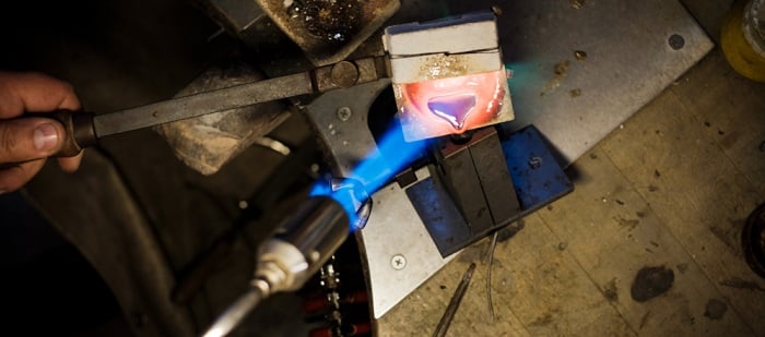 Pouring melted silver