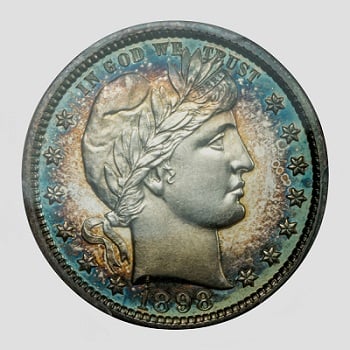 A Quarter-Dollar coin with a striking blue tone.
